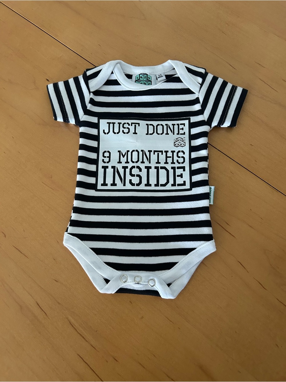 Striped Black & White Baby One-Piece Bodysuit - "Just Done 9 Months Inside"